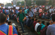 Mumbai train services badly hit as protesting students sit on rail tracks